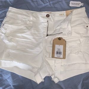 Brand new de-stressed white shorts size 9